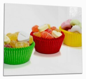 Wallario Herd-Abdeckplatte Sweets - Süßigkeiten-Muffins in der Küche